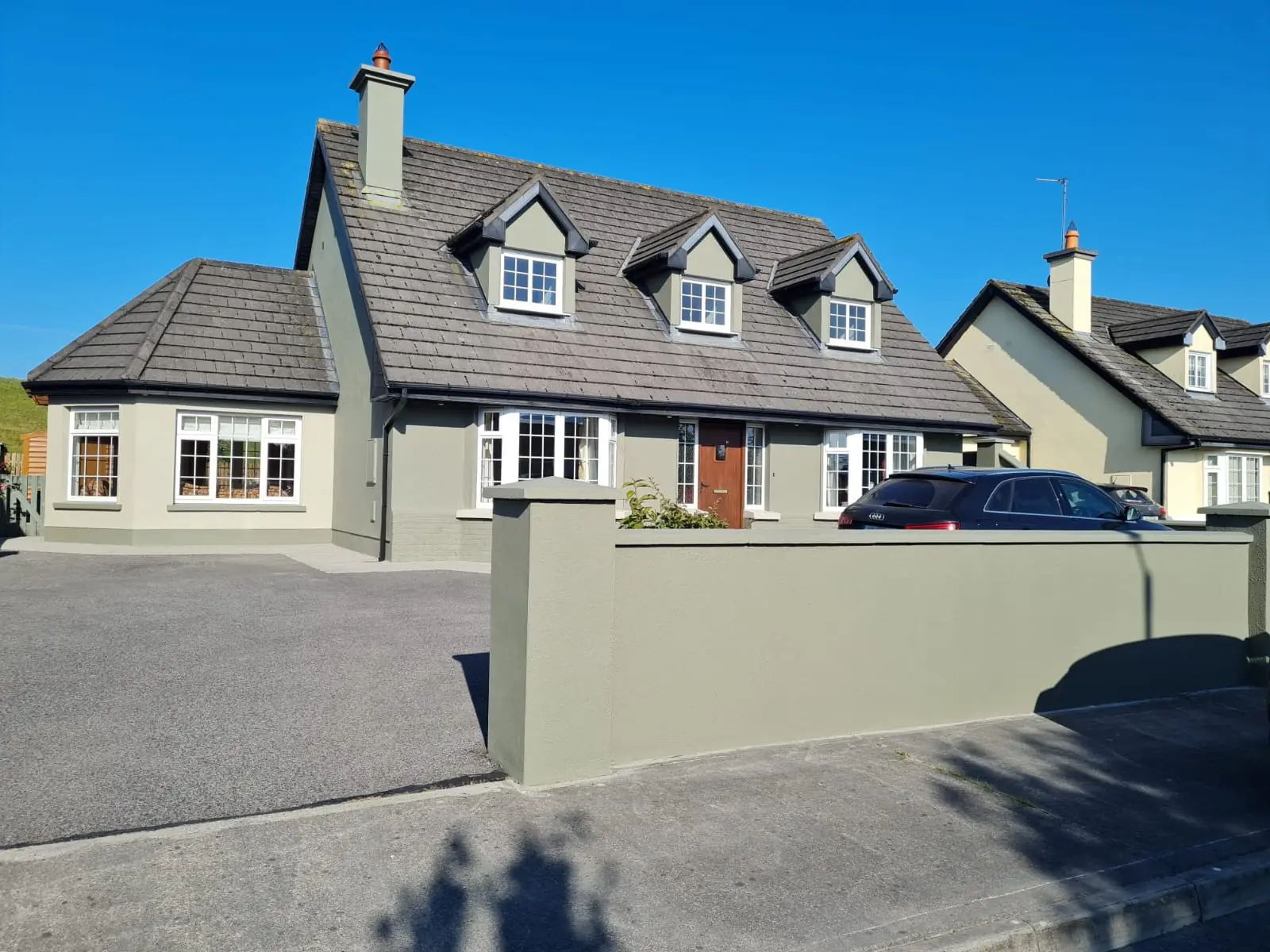 Building facade with specialist protective coating applied by MS Partners painting contractors