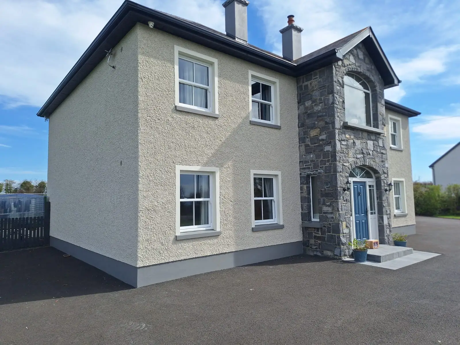 Modern commercial facade design with professional paint finish by MS Partners